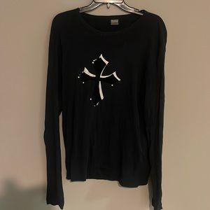 Black long sleeve cross shirt.